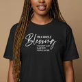 Black woman wearing a black t-shirt with a motivational quote on a brown background