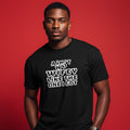 Man wearing a black t-shirt with white text on a red background