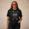 “Auntie Already Know shirt with spade design”
“Black woman wearing Auntie culture t-shirt”
“Spades inspired Auntie shirt black tee”