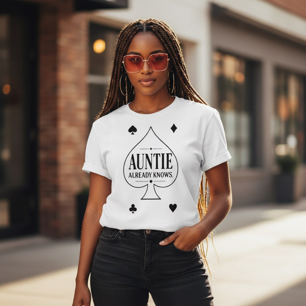 “Auntie Already Know shirt with spade design”
“Black woman wearing Auntie culture t-shirt”
“Spades inspired Auntie shirt black tee”
