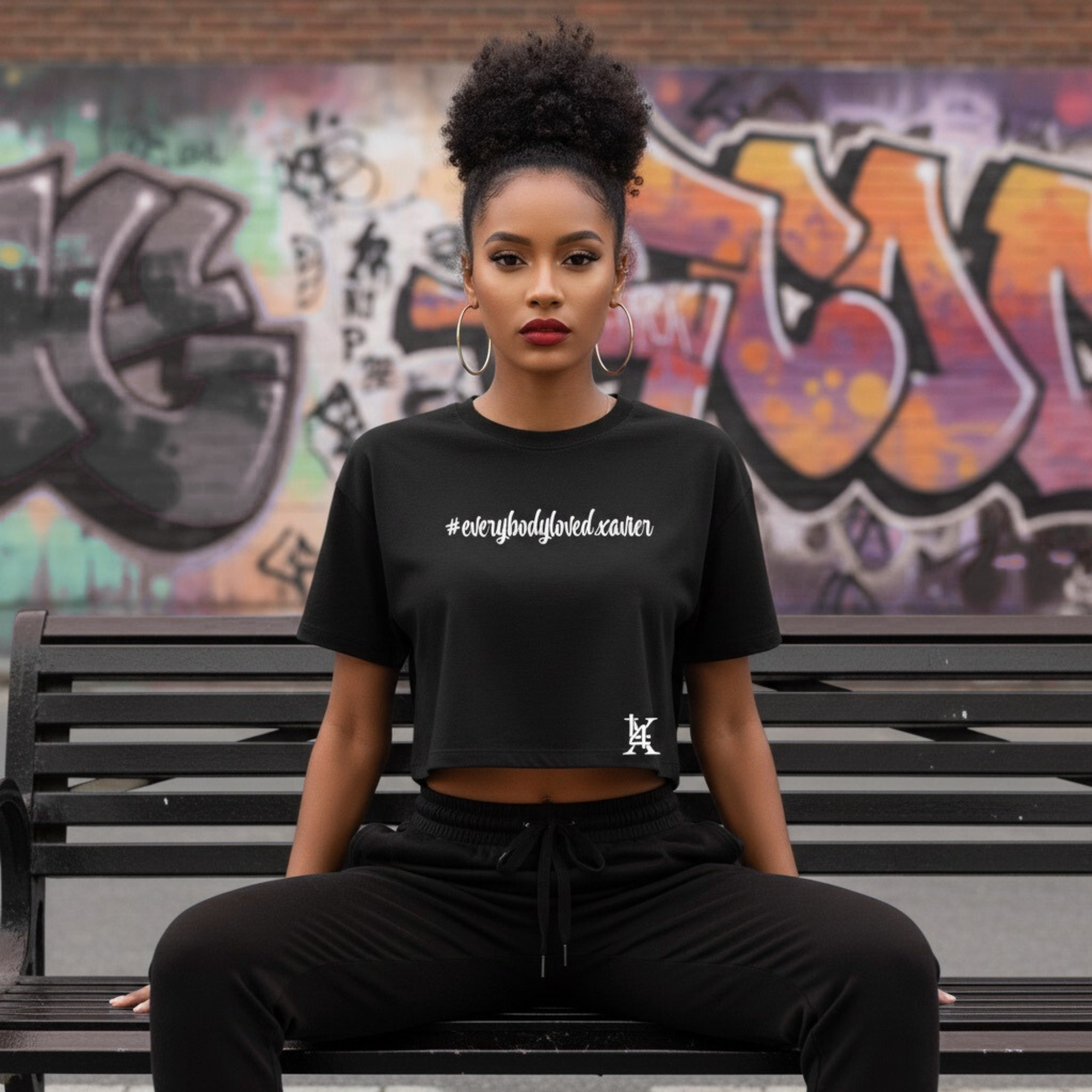 Black unisex statement t-shirt featuring Everybody Loved Xavier typography design by Legacy 4 Xavier