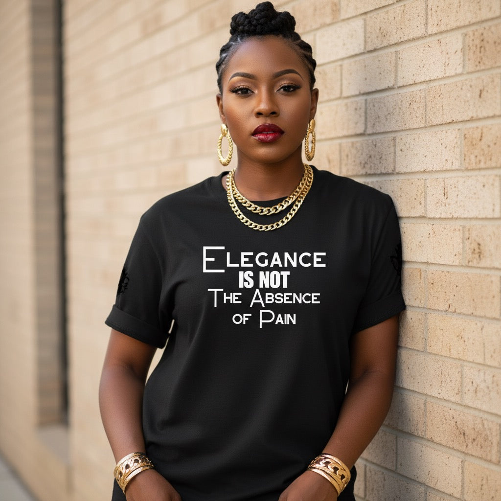 Woman wearing a black t-shirt with a quote, standing against a brick wall.