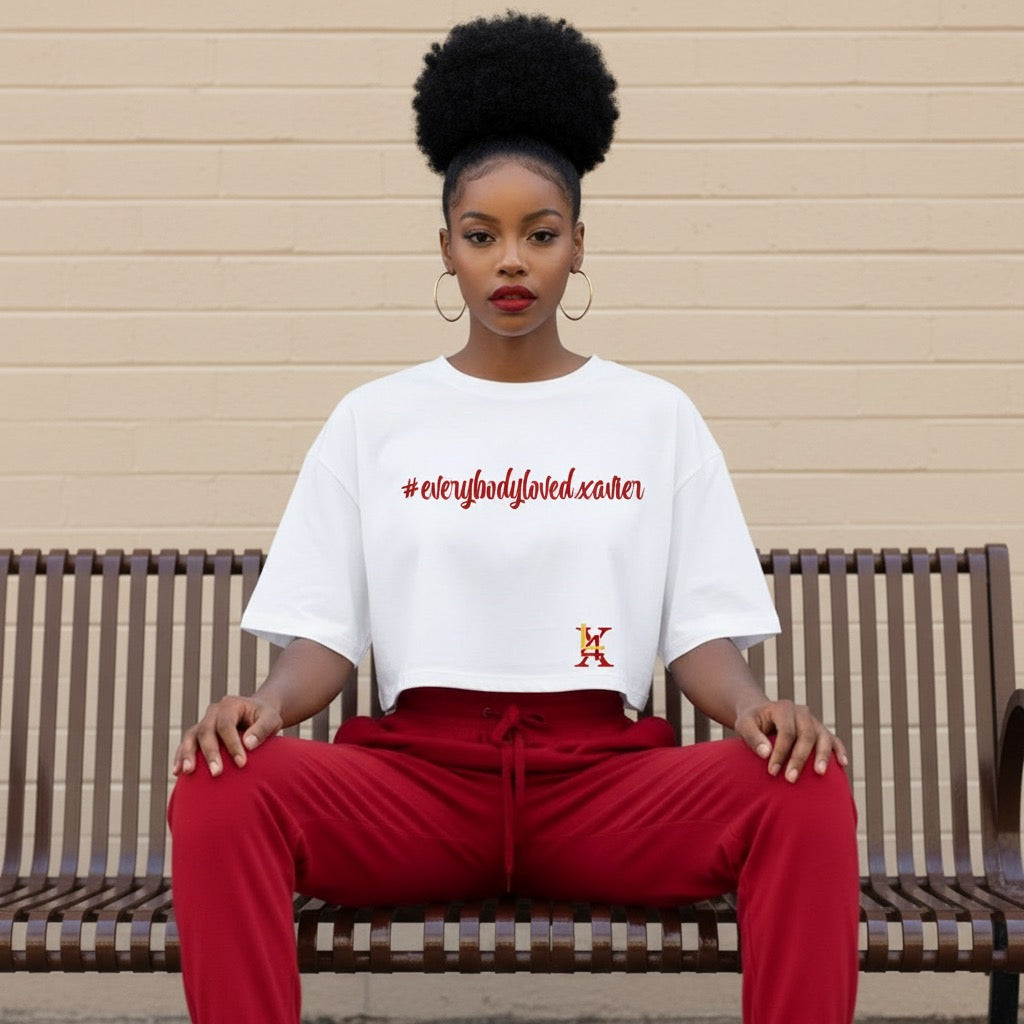 White Everybody Loved Xavier statement shirt inspired by legacy and community connection