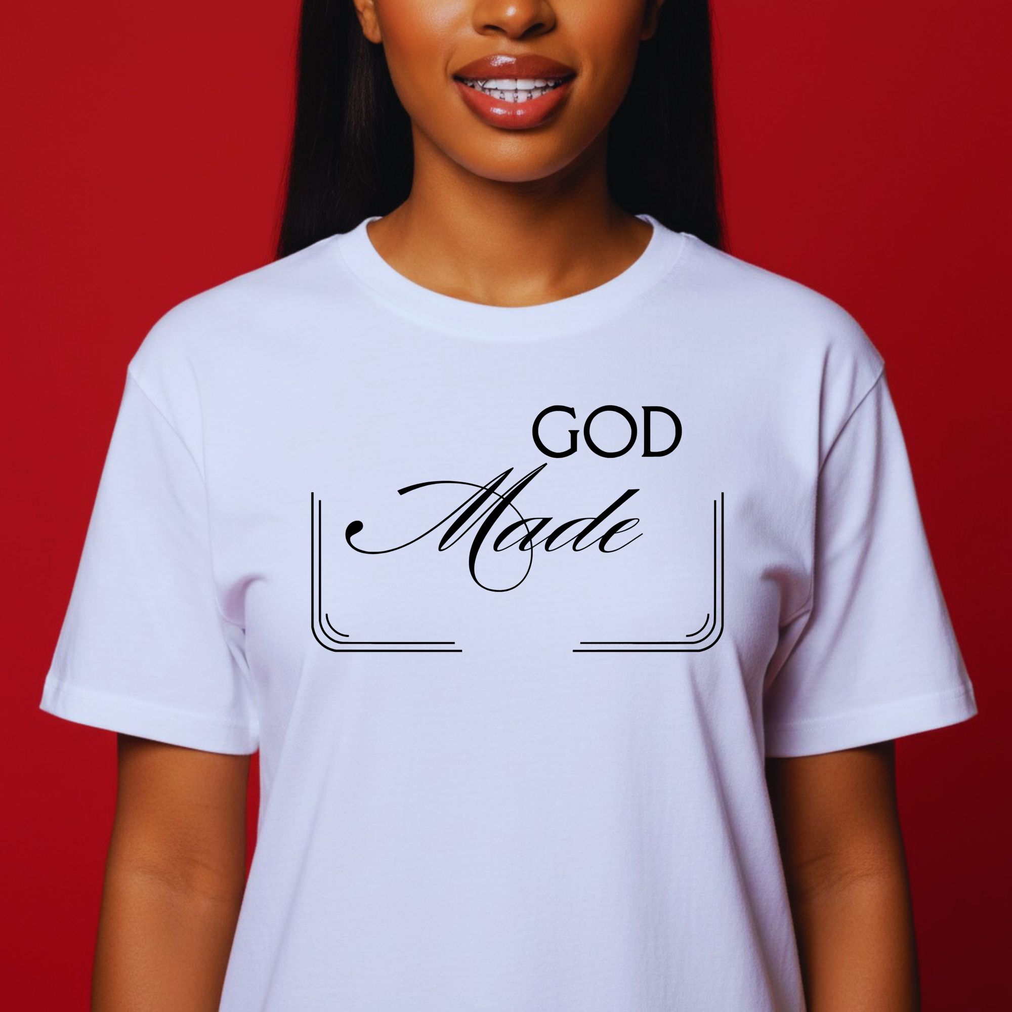 Person wearing a white t-shirt with 'GOD Made' text on a red background
