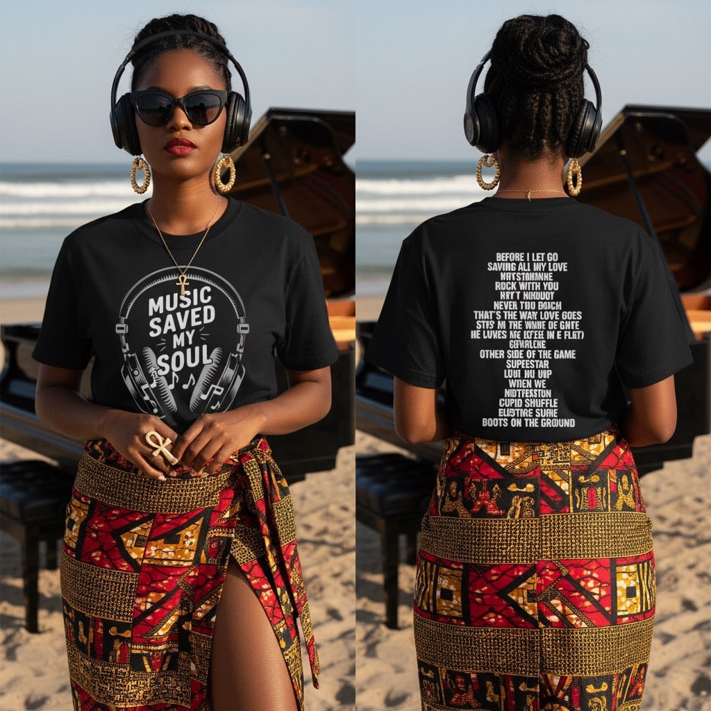 Woman wearing a black t-shirt with text and a colorful skirt on a beach.