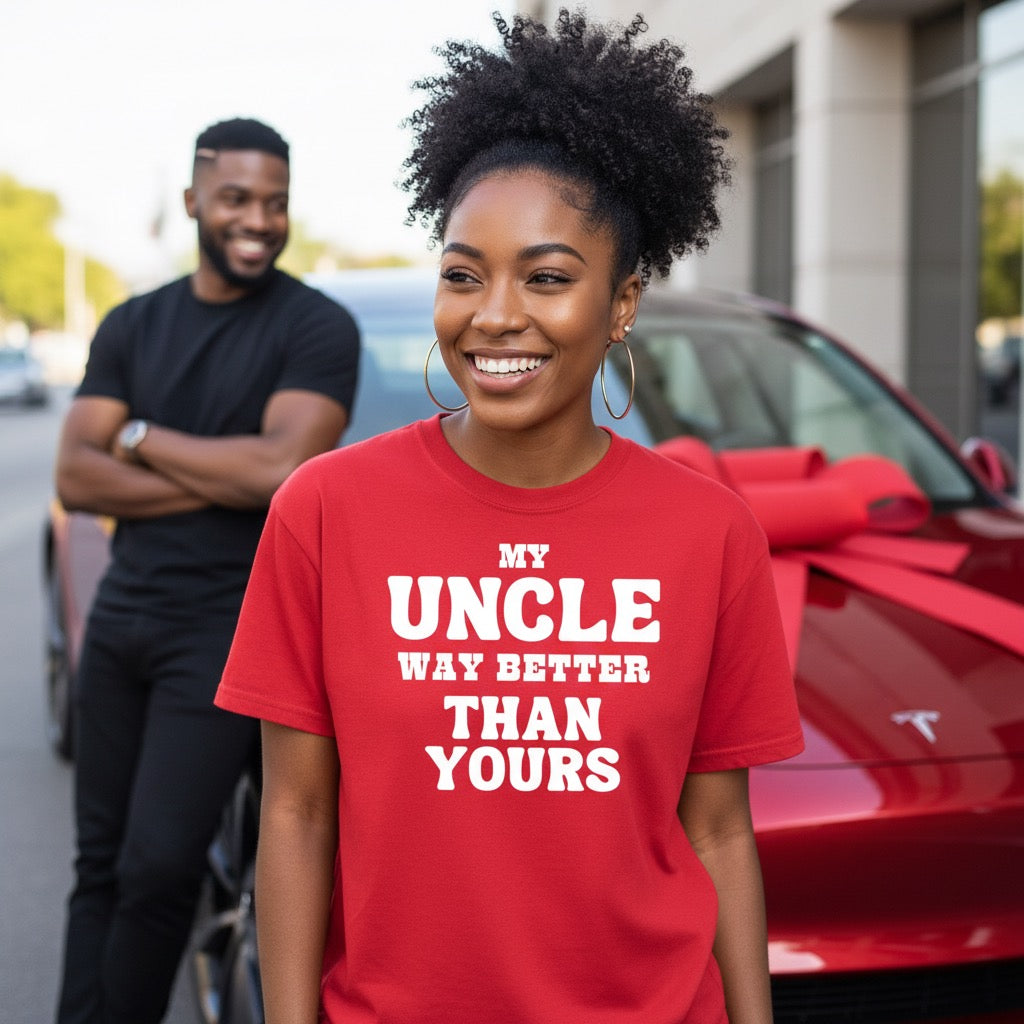 Woman wearing a red t-shirt with text standing in front of a red car.