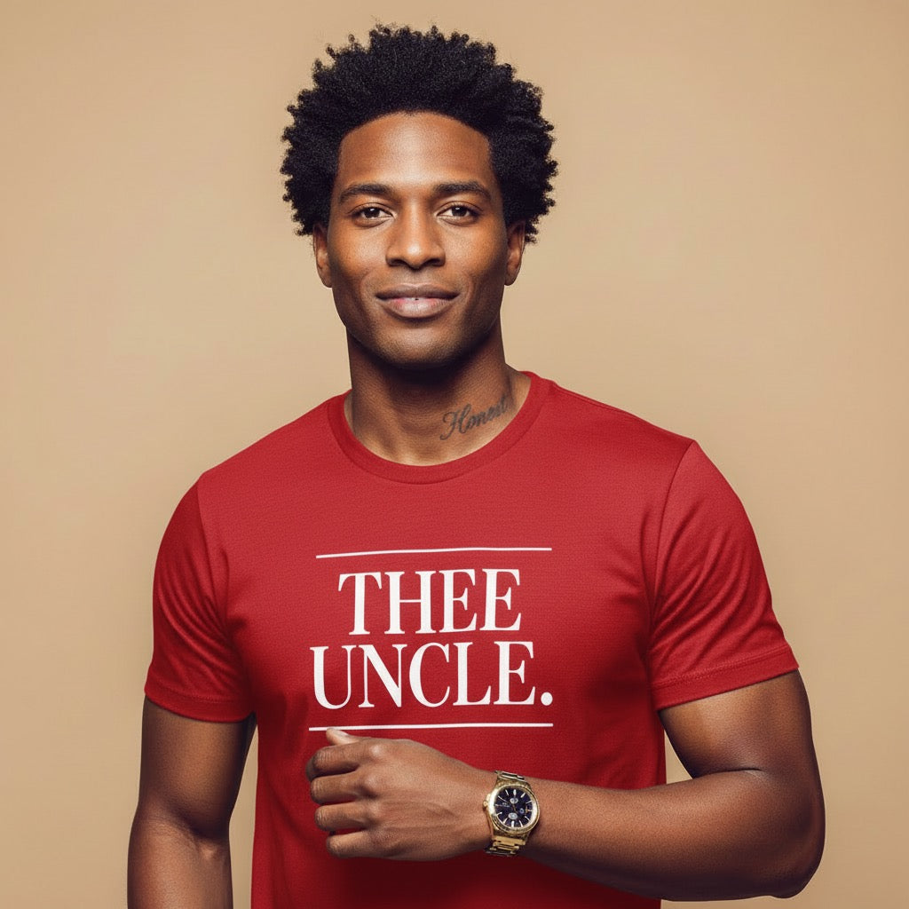 Man wearing a red t-shirt with 'THEE UNCLE.' text on a beige background