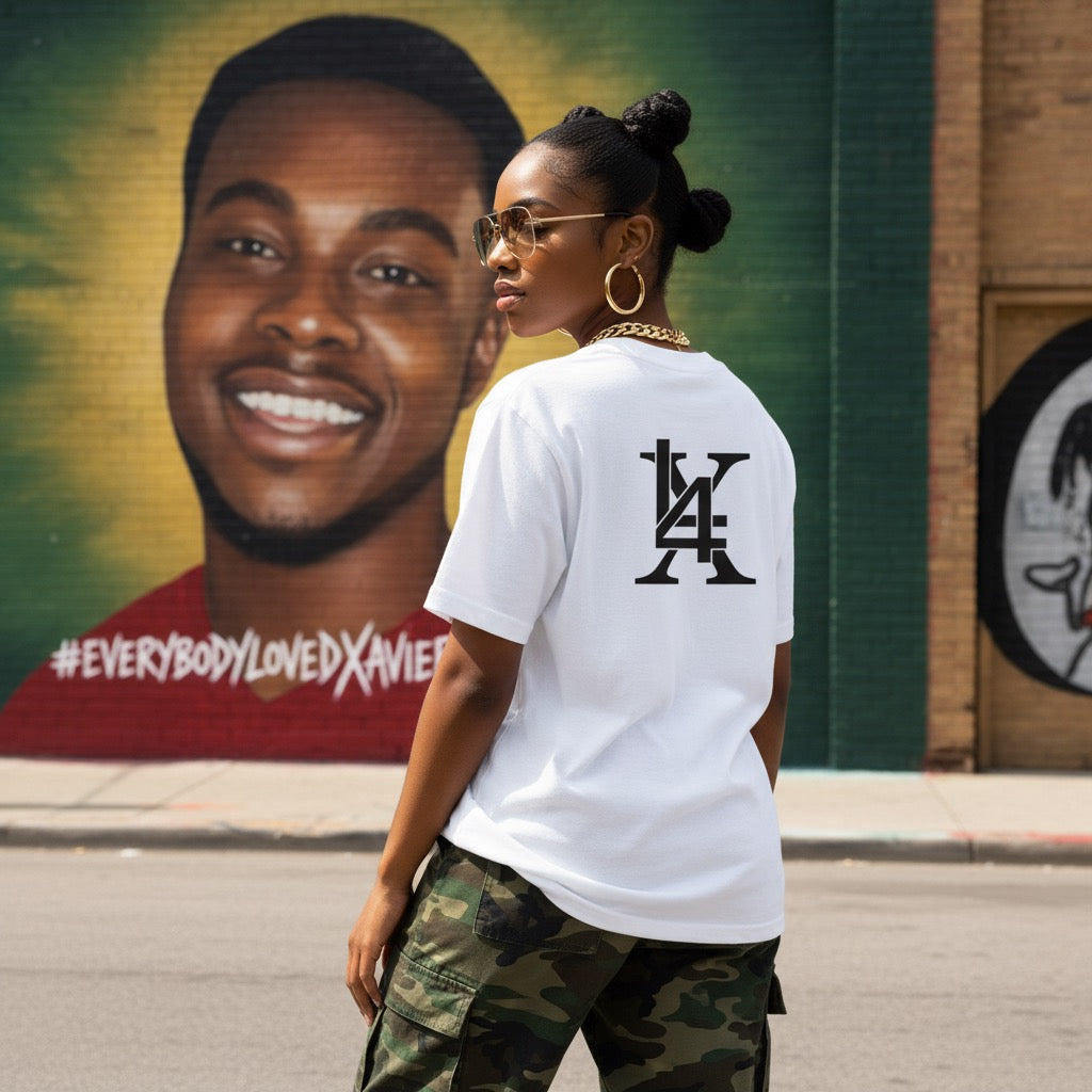 White Everybody Loved Xavier statement tee featuring Legacy 4 Xavier logo design