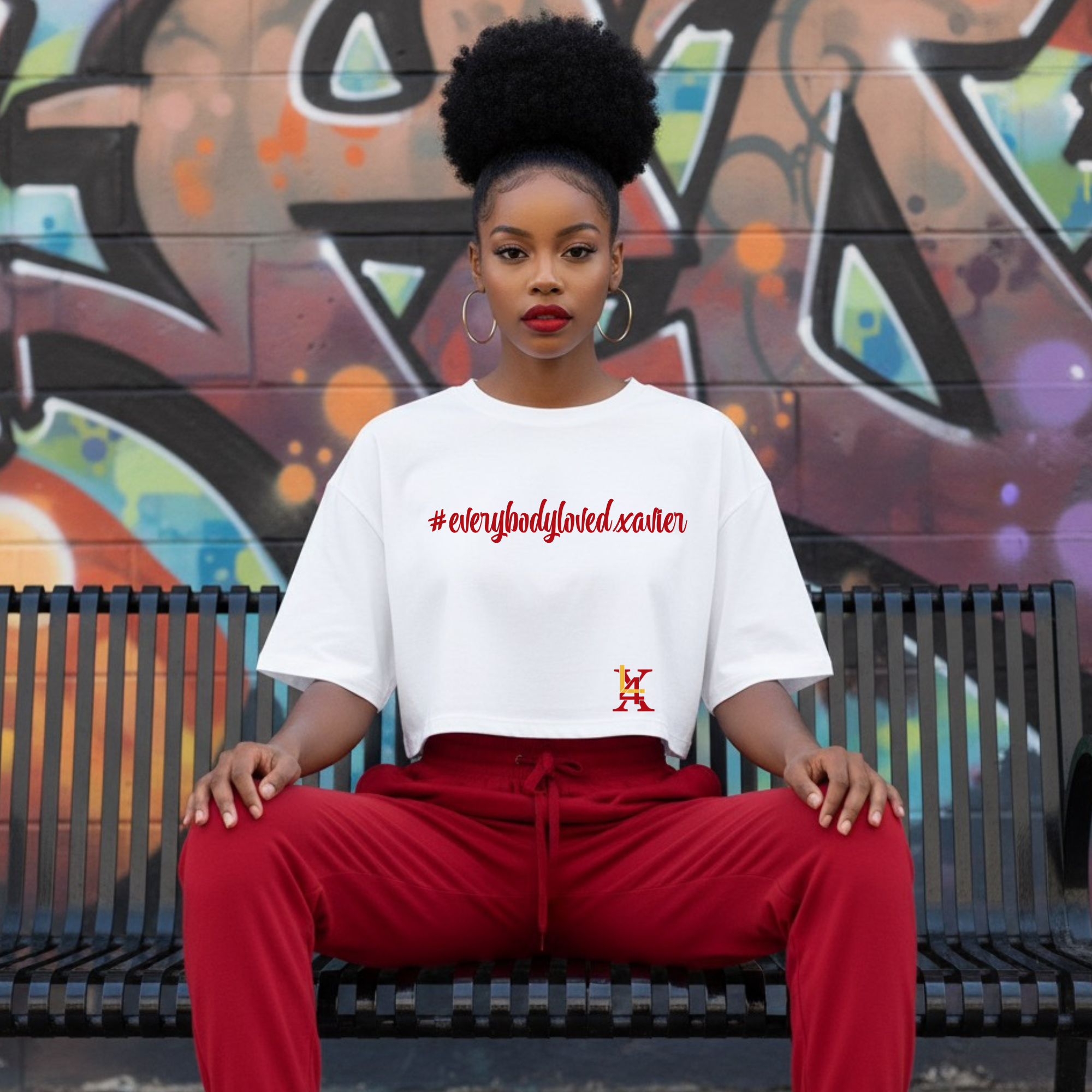 White Everybody Loved Xavier statement shirt inspired by legacy and community connection