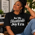 Black graphic t-shirt featuring “In My Unexplainable Joy Era” statement design by Legacy 4 Xavier