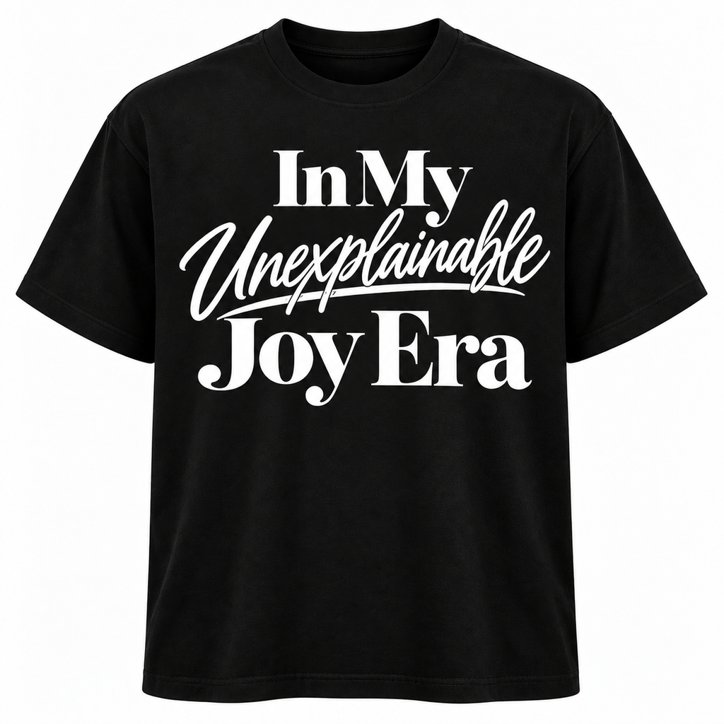 Black woman wearing an “In My Unexplainable Joy Era” graphic t-shirt from Legacy 4 Xavier