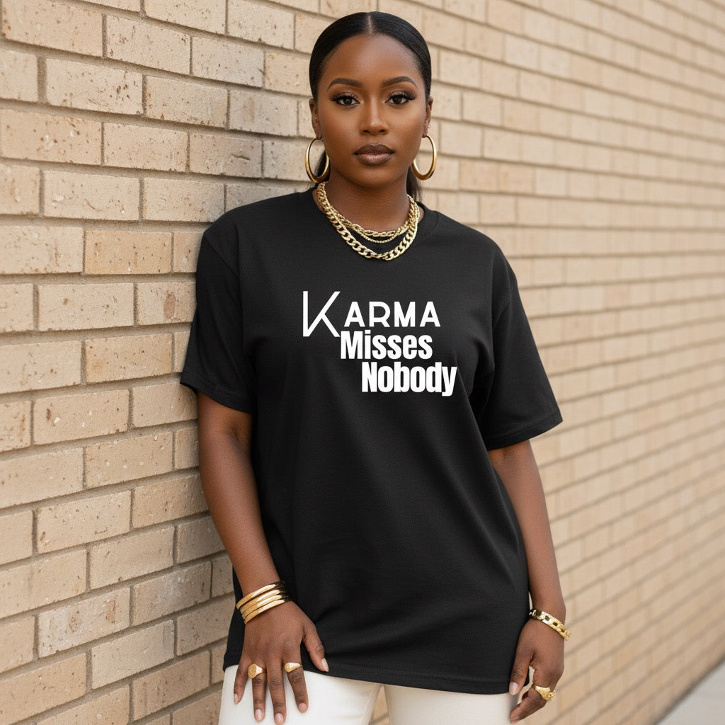 Black unisex statement t-shirt reading “Karma Misses Nobody” in bold minimal typography
