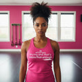 Pink racerback tank featuring the statement "We all out here trying and that's more than enough" by Legacy 4 Xavier.